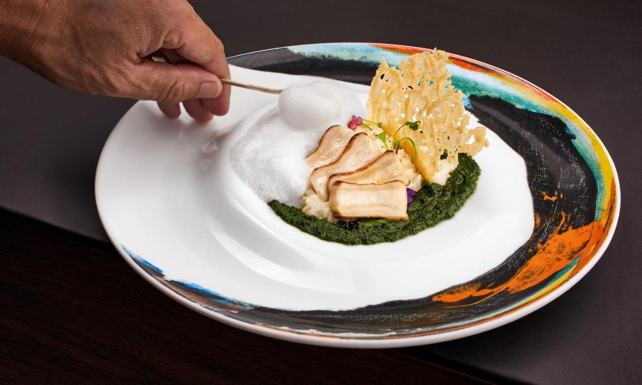 Ette Luxury Hotel & Spa Four Corners Exterior foto A plate of food