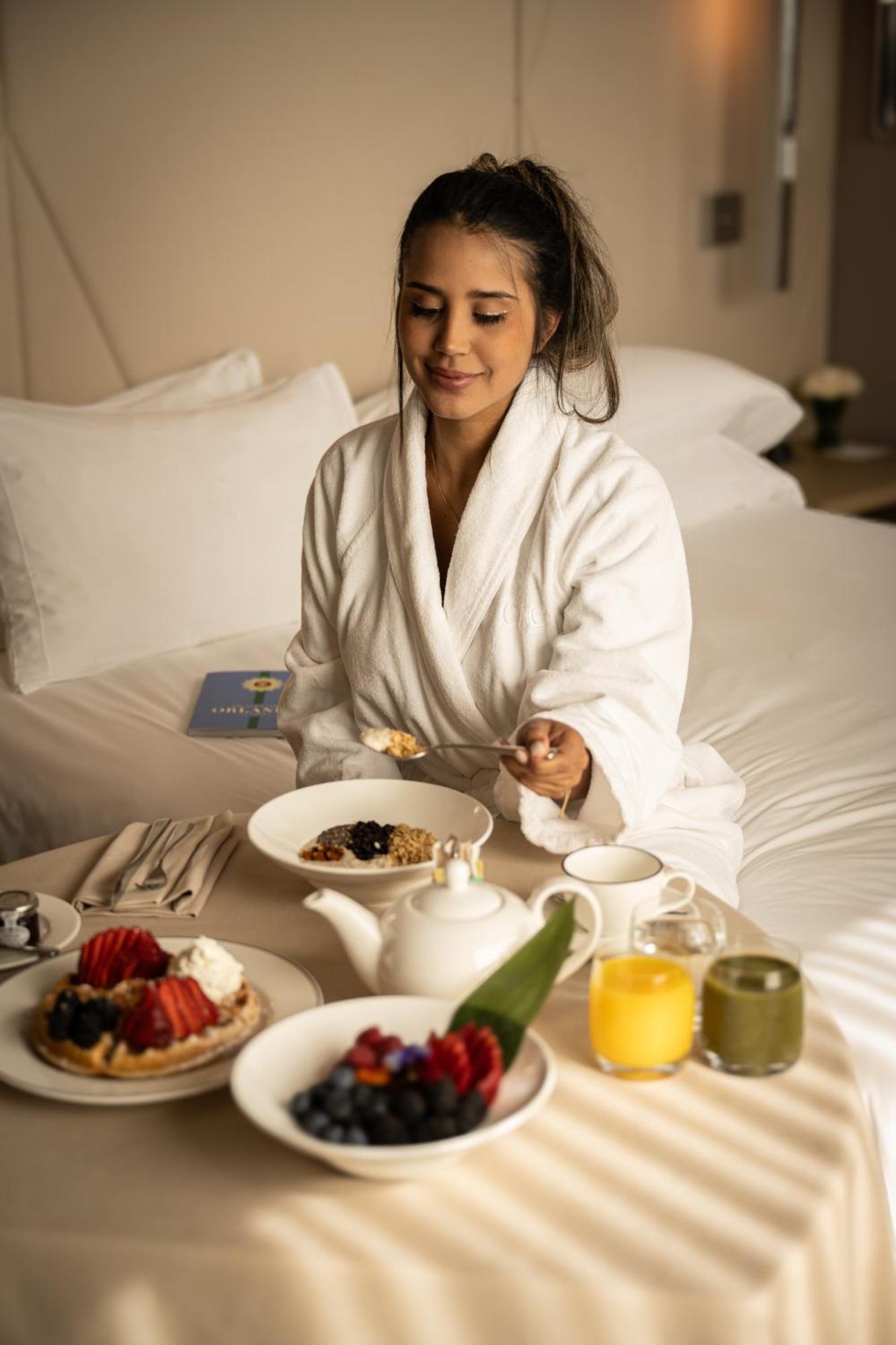 Ette Luxury Hotel & Spa Four Corners Exterior foto A woman wearing a bathrobe
